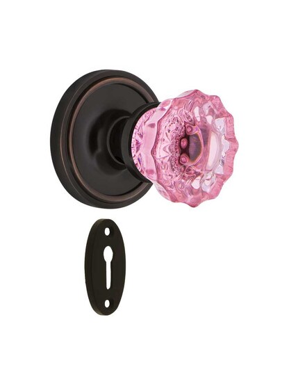 Classic Rosette Mortise Lock Set with Colored Fluted Crystal Glass Knobs Pink in Timeless Bronze.